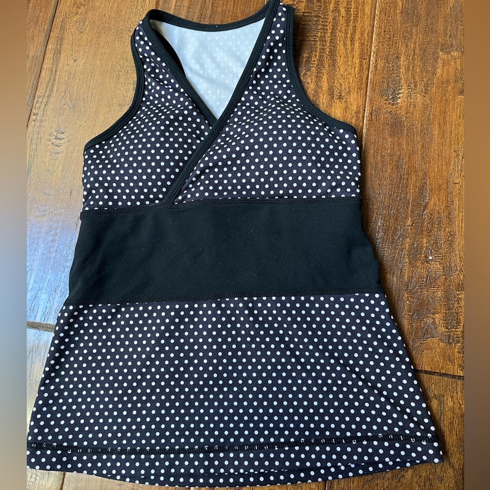 Unique Lululemon tank top with pads. Fitted and flattering.
